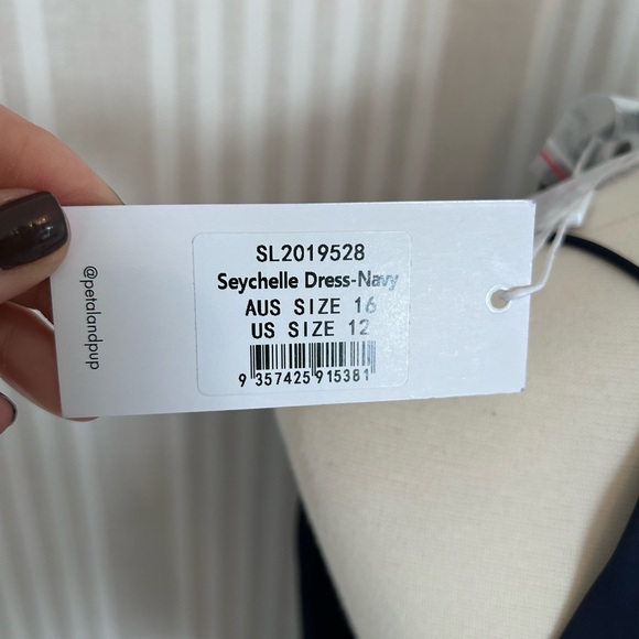 Petal & Pup Navy Seychelle Asymmetric Tiered
Cocktail Party Dress Size 12 NWT - Picture 8 of 11